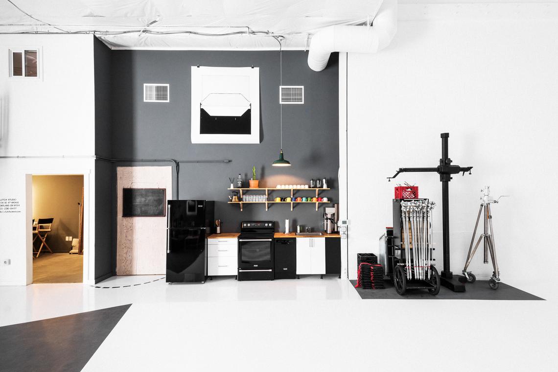 Kitchenette and camera stand on the concrete wedge floor
